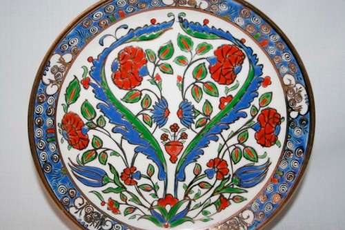 A beautifully made original Greek Keramikos Potteries hand painted plate with gorgeous bold colours