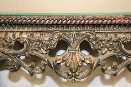 A fabulous antique wall mountable display shelf with amazing ormolu detailing and a glass top