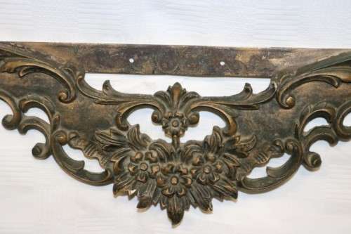 A fabulous antique wall mountable display shelf with amazing ormolu detailing and a glass top
