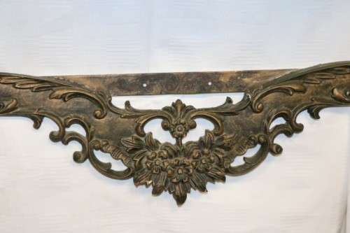 A fabulous antique wall mountable display shelf with amazing ormolu detailing and a glass top
