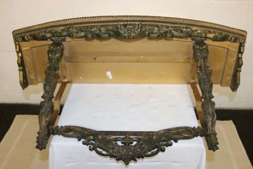 A fabulous antique wall mountable display shelf with amazing ormolu detailing and a glass top