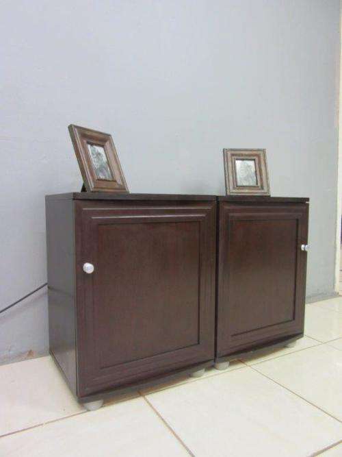 Two awesome and practical storage cabinet/ pedestals with space for storing linen, drinks, etc.