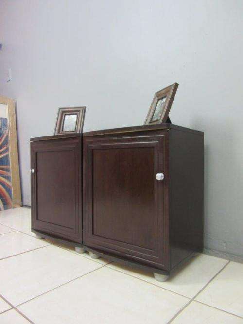 Two awesome and practical storage cabinet/ pedestals with space for storing linen, drinks, etc.