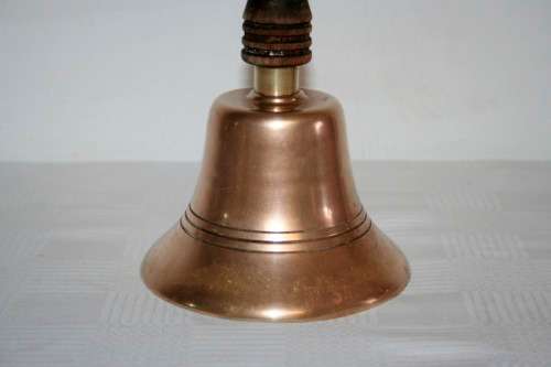 A gorgeous vintage (larger) solid brass hand bell/ school bell with a solid wooden handle