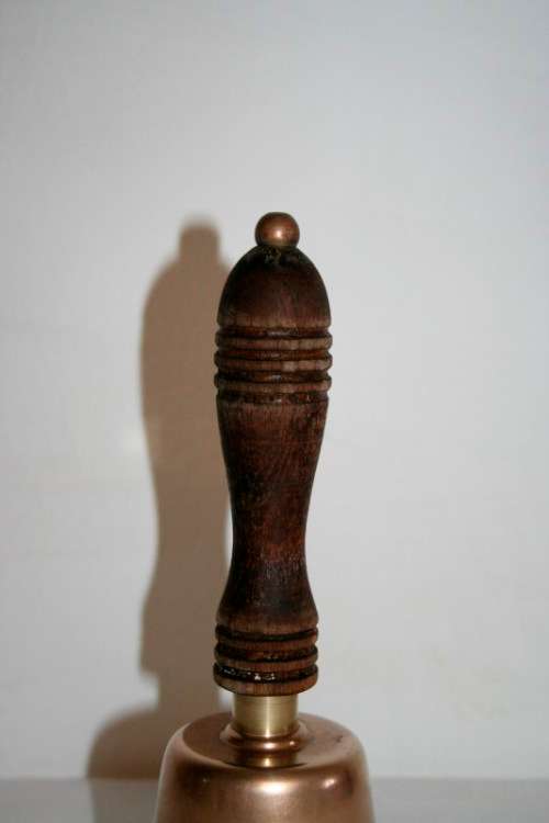 A gorgeous vintage (larger) solid brass hand bell/ school bell with a solid wooden handle