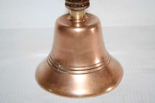 A gorgeous vintage (larger) solid brass hand bell/ school bell with a solid wooden handle