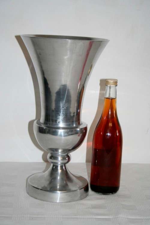 A stylish large pewter stemmed display urn-vase with a fluted flared lip and wide base
