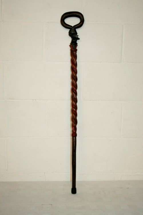 A beautifully hand carved solid wooden traditional central African walking stick - 90.5cm