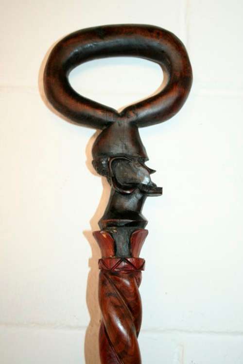 A beautifully hand carved solid wooden traditional central African walking stick - 90.5cm