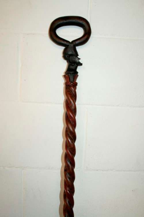 A beautifully hand carved solid wooden traditional central African walking stick - 90.5cm
