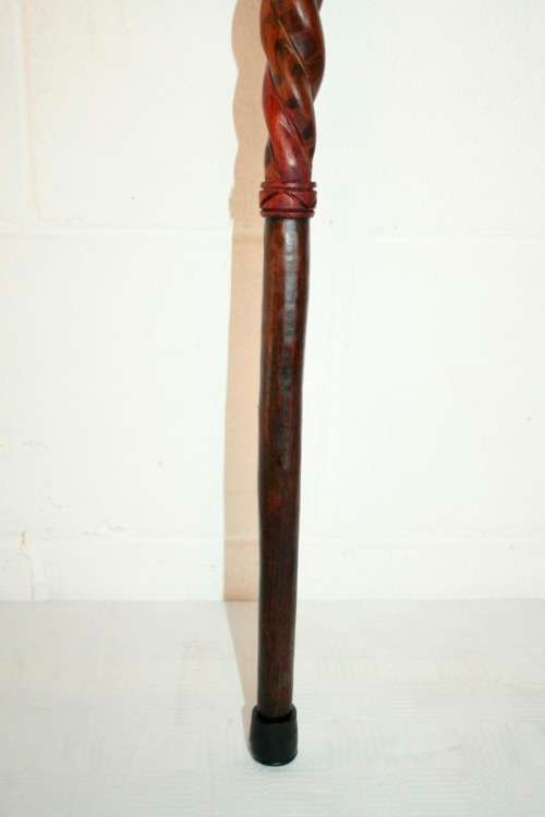 A beautifully hand carved solid wooden traditional central African walking stick - 90.5cm