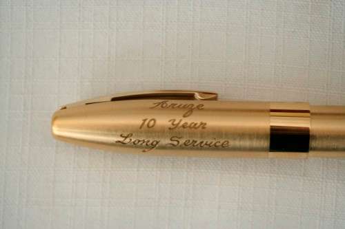 A superb boxed brushed 22ct gold plated engraved Sheaffer Legacy Heritage roller-ball pen
