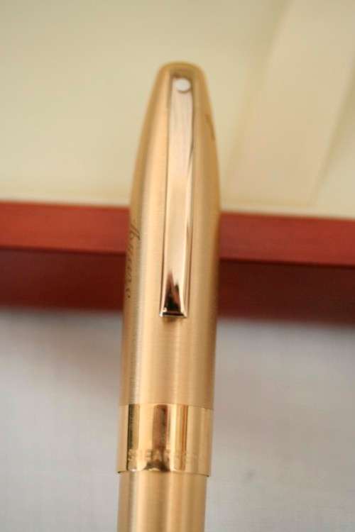 A superb boxed brushed 22ct gold plated engraved Sheaffer Legacy Heritage roller-ball pen