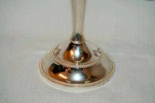 A fabulous tall 5-arm silver plated candelabra with ornate detailing and felt lined base