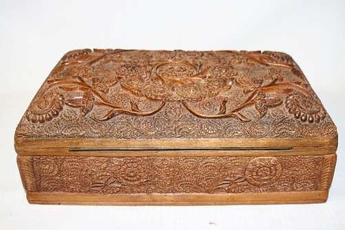 A fantastic hand carved wooden jewellery/ storage box with lovely detailing on it! Gorgeous!