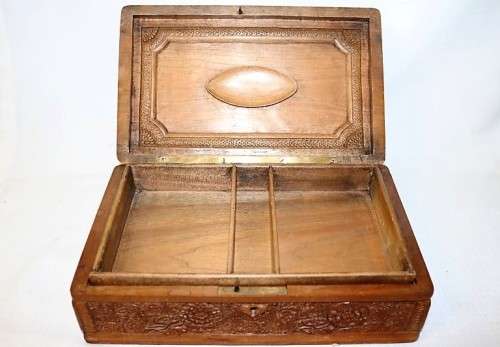 A fantastic hand carved wooden jewellery/ storage box with lovely detailing on it! Gorgeous!