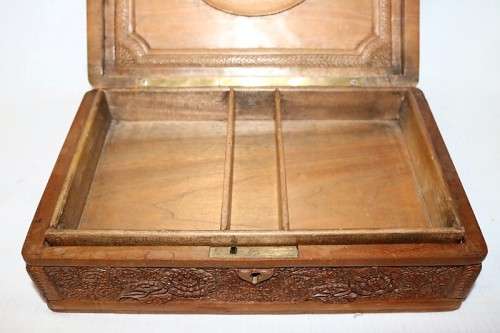 A fantastic hand carved wooden jewellery/ storage box with lovely detailing on it! Gorgeous!