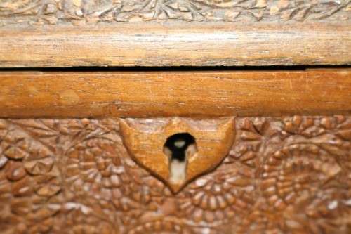 A fantastic hand carved wooden jewellery/ storage box with lovely detailing on it! Gorgeous!