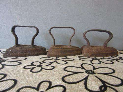 Three fantastic and very collectable vintage/ antique cast iron coal stove clothes iron - price/iron