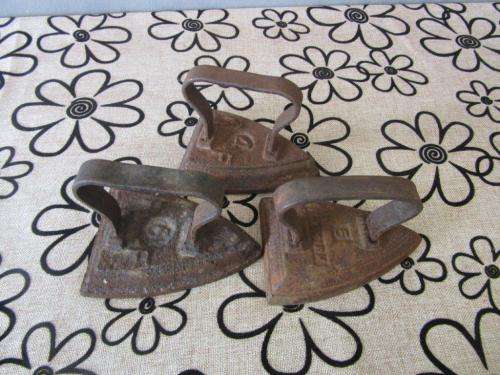 Three fantastic and very collectable vintage/ antique cast iron coal stove clothes iron - price/iron