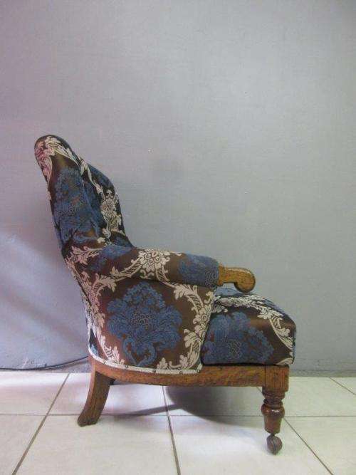 **RS17** A stylish Edwardian teak armchair w/ stunning upholstery & hand carved finishes on castors