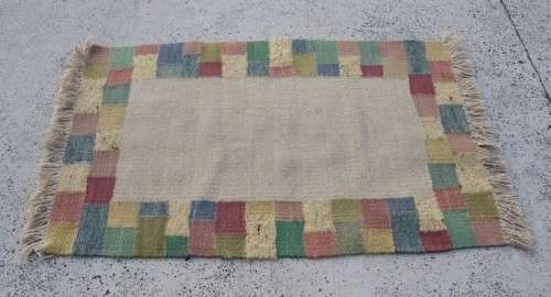 A stunning woven wool carpet in a soft pastel-colour block design, perfect bathroom rug - RS17Sale