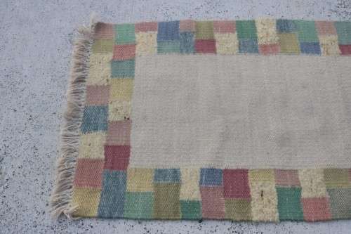 A stunning woven wool carpet in a soft pastel-colour block design, perfect bathroom rug - RS17Sale