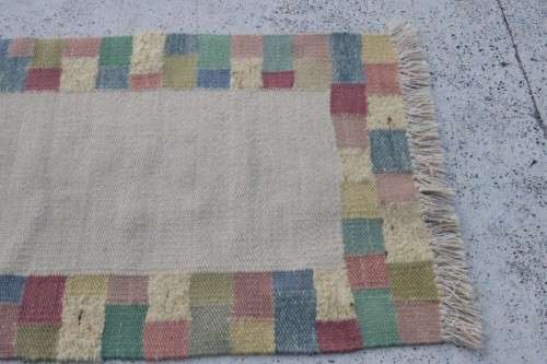 A stunning woven wool carpet in a soft pastel-colour block design, perfect bathroom rug - RS17Sale