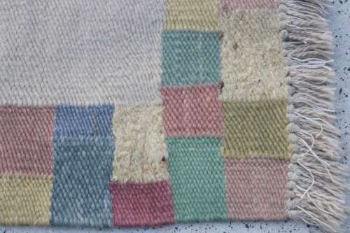 A stunning woven wool carpet in a soft pastel-colour block design, perfect bathroom rug - RS17Sale