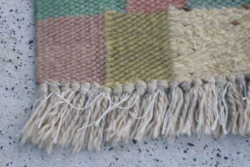 A stunning woven wool carpet in a soft pastel-colour block design, perfect bathroom rug - RS17Sale