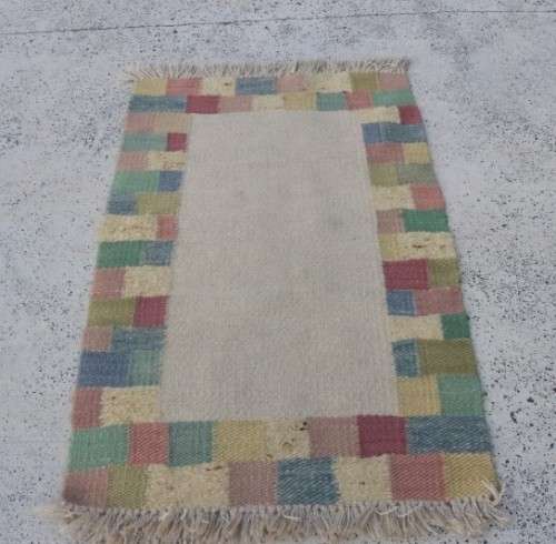 A stunning woven wool carpet in a soft pastel-colour block design, perfect bathroom rug - RS17Sale