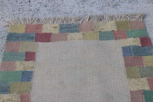 A stunning woven wool carpet in a soft pastel-colour block design, perfect bathroom rug - RS17Sale