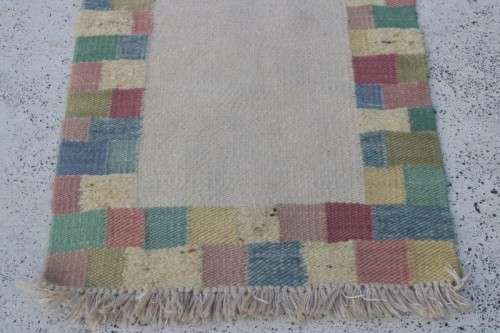 A stunning woven wool carpet in a soft pastel-colour block design, perfect bathroom rug - RS17Sale