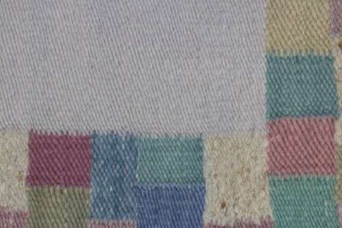 A stunning woven wool carpet in a soft pastel-colour block design, perfect bathroom rug - RS17Sale