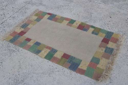 A stunning woven wool carpet in a soft pastel-colour block design, perfect bathroom rug - RS17Sale