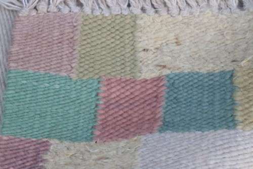 A stunning woven wool carpet in a soft pastel-colour block design, perfect bathroom rug - RS17Sale