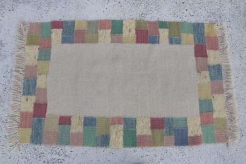 A stunning woven wool carpet in a soft pastel-colour block design, perfect bathroom rug - RS17Sale