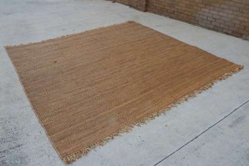A fabulous large (3m x 2,9m) organic "Jute" natural fibre hand woven floor carpet