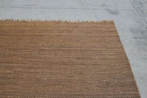 A fabulous large (3m x 2,9m) organic "Jute" natural fibre hand woven floor carpet