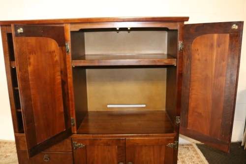An awesome large Imbuia cabinet with loads of cupboard space - awesome entertainment unit!