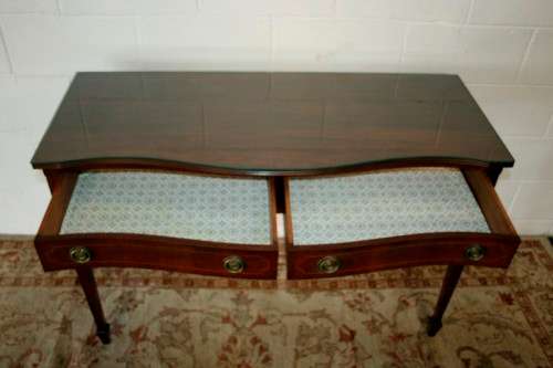 An incredible stylish two-drawer Teak console table with rail inlay detailing & awesome ring handles