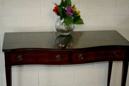 An incredible stylish two-drawer Teak console table with rail inlay detailing & awesome ring handles