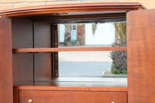 A stunning & stylish (tall) drinks cabinet with a fold-down serving shelf and loads of storage space