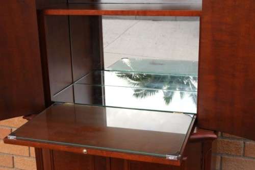A stunning & stylish (tall) drinks cabinet with a fold-down serving shelf and loads of storage space