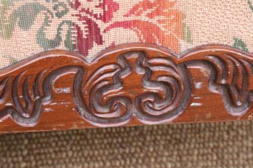 A wonderful antique hand carved ball and claw three-seater wicker-back sofa w/ upholstered cushions