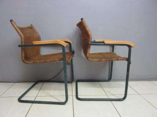 Two stunning wicker arm chairs in stunning condition - extra seating in the house - price/chair