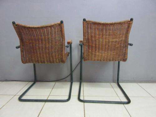 Two stunning wicker arm chairs in stunning condition - extra seating in the house - price/chair