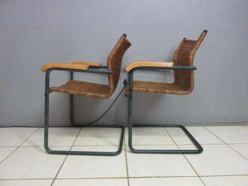 Two stunning wicker arm chairs in stunning condition - extra seating in the house - price/chair