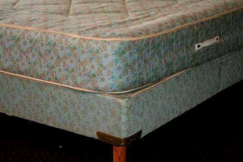 A stunning upholstered double-bed buttoned headboard with a Warner mattress & base.RS17Bed
