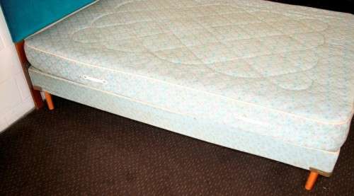 A stunning upholstered double-bed buttoned headboard with a Warner mattress & base.RS17Bed